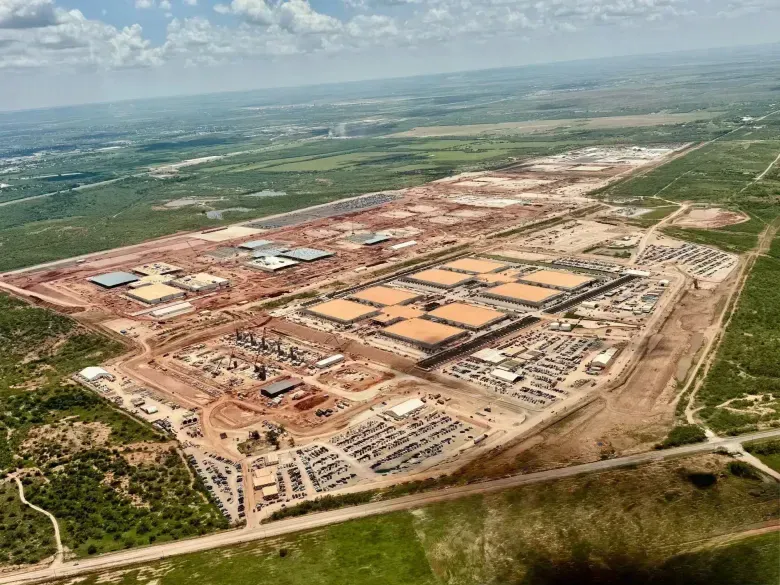 Aerial view of the Crusoe AI data center campus under construction in Abilene, Texas